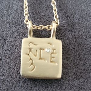 Me & Ro Tiny Compassion 10k gold Slate Pendant Necklace.